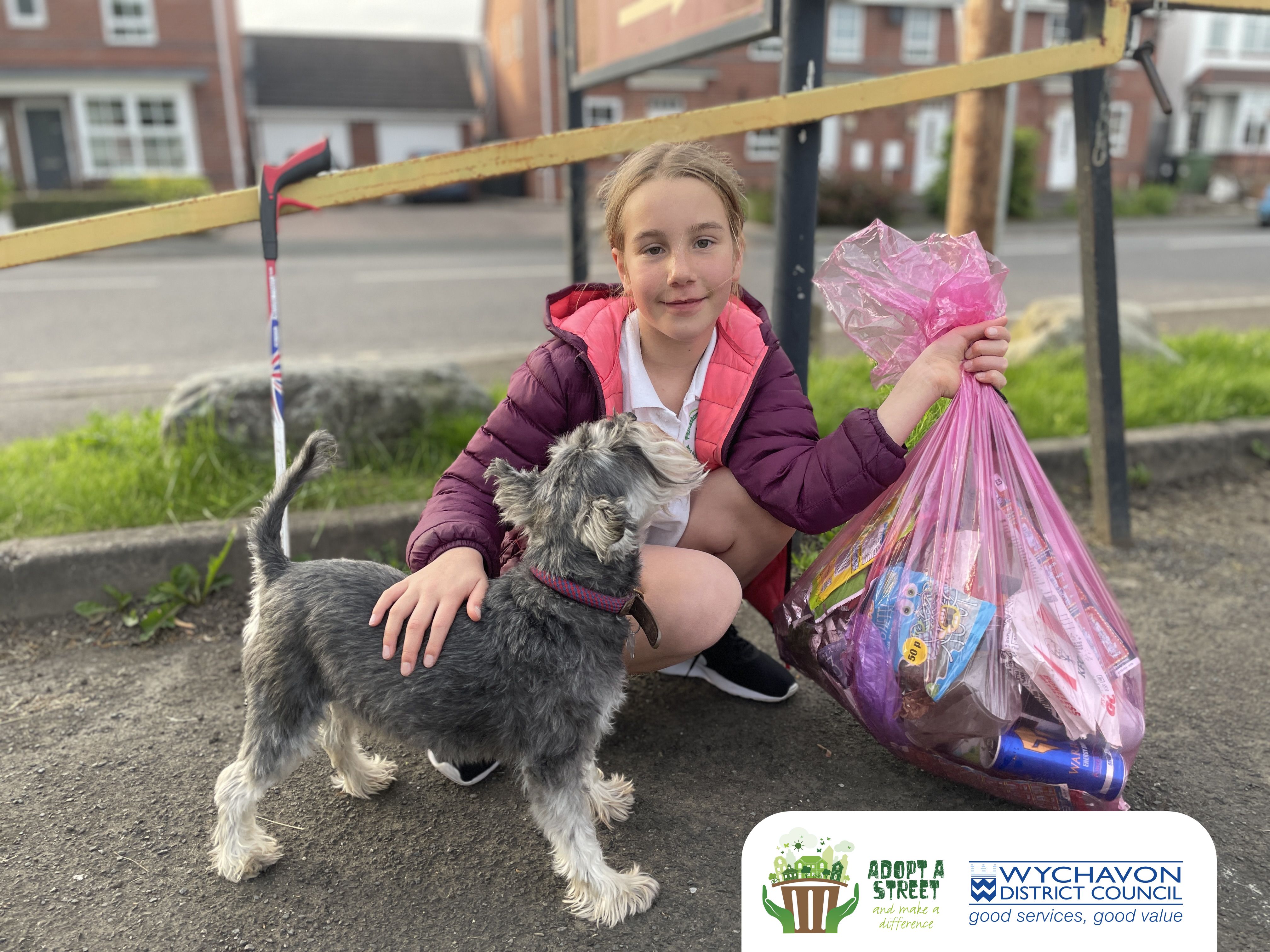 Girl collecting rubbish